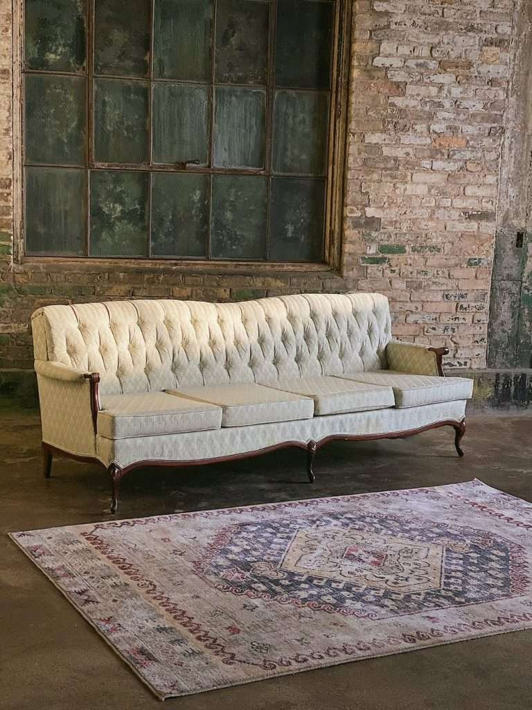 white antique photography couch