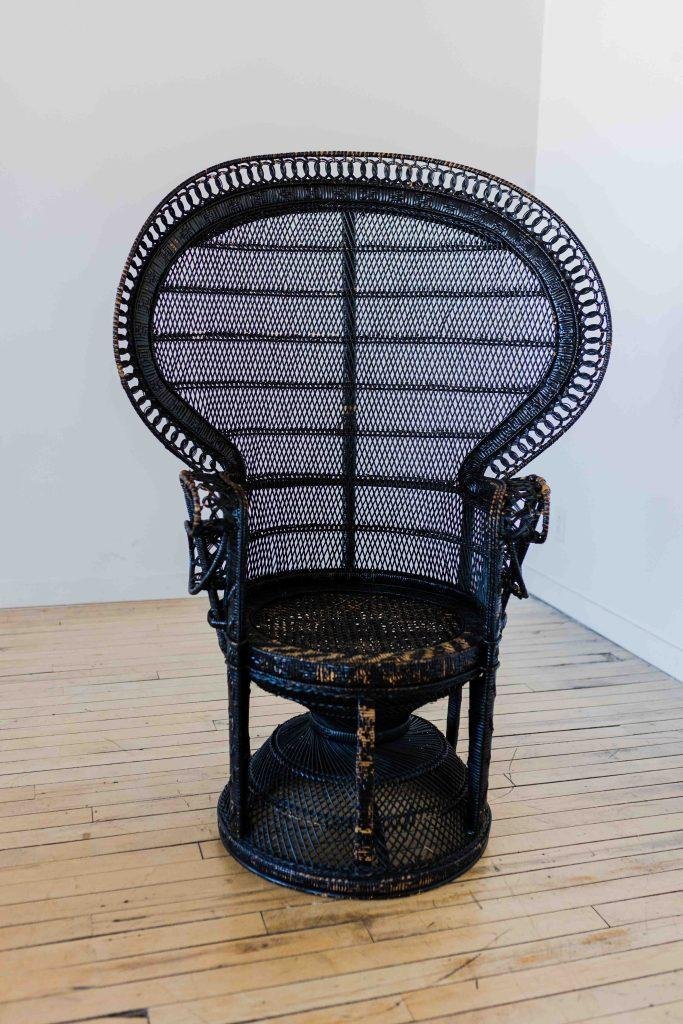 black wicker photography prop chair